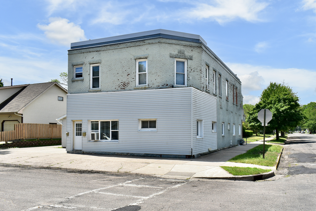 Front Of Building - Brick &Amp; Beam Property Management